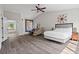 Spacious main bedroom with wood-look floors and ample natural light at 1786 Jameson Cir, Lawrenceville, GA 30043