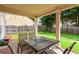 Covered outdoor patio with furniture, ideal for relaxation at 1786 Jameson Cir, Lawrenceville, GA 30043
