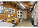 Finished basement area with desk and shelving, perfect for a home office or hobby space at 185 Fox Run, Loganville, GA 30052