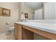 Neutral bathroom featuring a white sink, cabinets, toilet, and decor at 185 Fox Run, Loganville, GA 30052