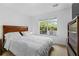 Inviting bedroom with large bed, window providing natural light at 185 Fox Run, Loganville, GA 30052