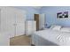 Inviting bedroom featuring serene blue walls, double closets and natural light at 185 Fox Run, Loganville, GA 30052