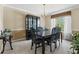 Formal dining room with stylish furniture and ample natural light at 185 Fox Run, Loganville, GA 30052