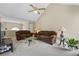 Comfortable living room with vaulted ceilings and natural light at 185 Fox Run, Loganville, GA 30052