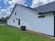 Exterior of home showing white siding and a well-maintained lawn at 301 Brooke View Trail, Canton, GA 30115