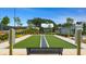 Enjoy the outdoors with a bocce ball court area surrounded by lush greenery and stone pathway at 301 Brooke View Trail, Canton, GA 30115