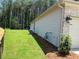 Exterior of home with green lawn at 354 Brooke View Trail, Canton, GA 30115