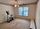 Bedroom with an exercise bike and natural light from the window at 1106 Shiloh Nw Ln, Kennesaw, GA 30144