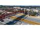 An aerial view of a bridge crossing a road into Peachtree Corners, with commercial buildings and trees in the background at 3272 Monarch Pine Dr, Peachtree Corners, GA 30071