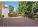 Expansive back deck with wood railings, grill, and a partial view of the home's exterior at 3272 Monarch Pine Dr, Peachtree Corners, GA 30071