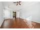 Main bedroom features hardwood floors, ceiling fan, and double doors at 3272 Monarch Pine Dr, Peachtree Corners, GA 30071