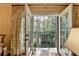 Balcony view with glass doors opens onto a metal-railed outdoor porch at 5415 Northland Ne Dr # 303, Atlanta, GA 30342