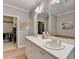 Elegant bathroom features double sinks, walk in closet, and ample counter space at 5415 Northland Ne Dr # 303, Atlanta, GA 30342