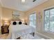 Cozy bedroom featuring a bed, neutral walls, and natural light from the windows at 5415 Northland Ne Dr # 303, Atlanta, GA 30342