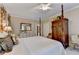 Bright bedroom featuring a four-poster bed, with wardrobe and neutral decor at 5415 Northland Ne Dr # 303, Atlanta, GA 30342