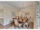 Elegant dining room featuring a chandelier, hardwood floors, and neutral paint at 5415 Northland Ne Dr # 303, Atlanta, GA 30342