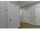 Hallway with multiple doors and unit numbers 30, 32, 34 and 38 visible at 5415 Northland Ne Dr # 303, Atlanta, GA 30342