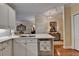 Bright kitchen with white cabinets, stainless appliances, and an eat-in area at 5415 Northland Ne Dr # 303, Atlanta, GA 30342