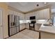 Updated kitchen features stainless steel appliances, ample storage, and white cabinets at 5415 Northland Ne Dr # 303, Atlanta, GA 30342