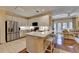 Updated white kitchen featuring stainless steel appliances and a breakfast bar at 5415 Northland Ne Dr # 303, Atlanta, GA 30342