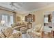 Inviting living room with cozy furniture, hardwood floors, and balcony access at 5415 Northland Ne Dr # 303, Atlanta, GA 30342