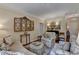 Comfortable living room with hardwood floors, a decorator mirror and stylish furnishings at 5415 Northland Ne Dr # 303, Atlanta, GA 30342