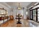 Lobby featuring a chandelier, table, chairs, and a view into a meeting room at 5415 Northland Ne Dr # 303, Atlanta, GA 30342