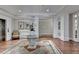 Elegant lobby featuring a stone table and hardwood flooring with an elevator at 5415 Northland Ne Dr # 303, Atlanta, GA 30342