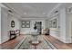 Lobby with a central table, decorative rug, sitting chairs and an elevator at 5415 Northland Ne Dr # 303, Atlanta, GA 30342