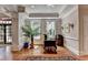 Cozy reception area with hardwood floors, natural light and a decorative rug at 5415 Northland Ne Dr # 303, Atlanta, GA 30342