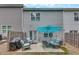 Townhome backyard with patio featuring an outdoor lounge area at 738 Woodstock Grove Dr, Woodstock, GA 30188