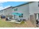 Home backyard features an outdoor dining and lounge area at 738 Woodstock Grove Dr, Woodstock, GA 30188
