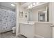 Clean bathroom with a large mirror and shower-tub combo at 1504 Wingate Way, Atlanta, GA 30350