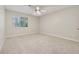 Cozy bedroom with neutral carpet, bright window, and ample space at 1504 Wingate Way, Atlanta, GA 30350