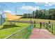 Community dog park with shade sails, seating, and play area, perfect for pets to exercise and relax at 1504 Wingate Way, Atlanta, GA 30350