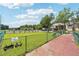 Well-equipped community dog park with convenient dog toy and stick stations and walking trail for owners at 1504 Wingate Way, Atlanta, GA 30350