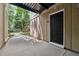 Private entrance with a covered walkway and lush greenery at 1504 Wingate Way, Atlanta, GA 30350