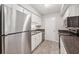 Well-lit kitchen with stainless steel appliances and ample counter space at 1504 Wingate Way, Atlanta, GA 30350