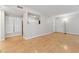 Spacious living area with hardwood floors and kitchen view at 1504 Wingate Way, Atlanta, GA 30350
