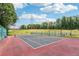 Community tennis court for active lifestyles, perfect for friendly matches and outdoor exercise in a private setting at 1504 Wingate Way, Atlanta, GA 30350