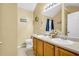 Bathroom featuring double sinks, tile flooring, vanity with wood cabinetry, and good lighting at 191 Baywood Way, Hiram, GA 30141