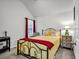 Cozy bedroom with a bright window, red accents, and a comfortable bed at 191 Baywood Way, Hiram, GA 30141