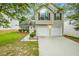 Charming two-story home with a well-manicured lawn, two-car garage, and inviting curb appeal at 191 Baywood Way, Hiram, GA 30141