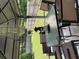 Relaxing covered patio with outdoor dining set, ideal for entertaining or enjoying the backyard at 191 Baywood Way, Hiram, GA 30141