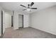This bedroom features a modern ceiling fan, neutral color palette, and closet at 1910 Countryside Se Pl, Smyrna, GA 30080