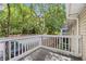 Wooden deck overlooking a wooded area, providing privacy and natural views at 1910 Countryside Se Pl, Smyrna, GA 30080