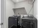 Laundry room with a front-load washer and dryer at 1910 Countryside Se Pl, Smyrna, GA 30080