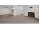 A view of the living room and a glimpse into the kitchen area featuring new appliances at 1910 Countryside Se Pl, Smyrna, GA 30080
