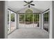 A sunroom with lots of sunlight due to the many windows at 1910 Countryside Se Pl, Smyrna, GA 30080