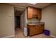 Basement with kitchenette, cabinets, and a small sink at 217 Bridgewater Trl, Canton, GA 30115